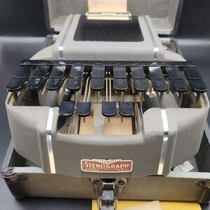 Gray and Black Stenotype Machine